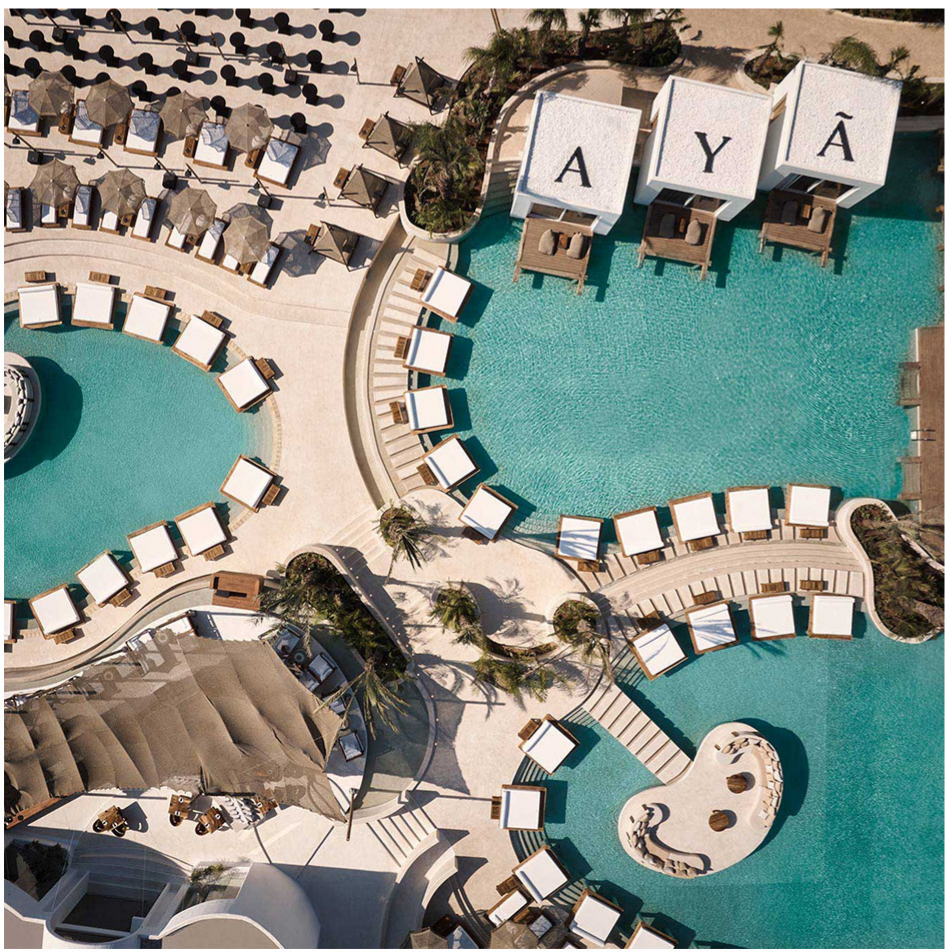Aerial view of the pool and AYÀ cabanas at AYÀ Resort